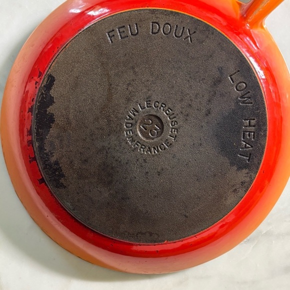 Le Creuset low heat enamelled cast iron skillet with nonstick coating in flame - Picture 2 of 5
